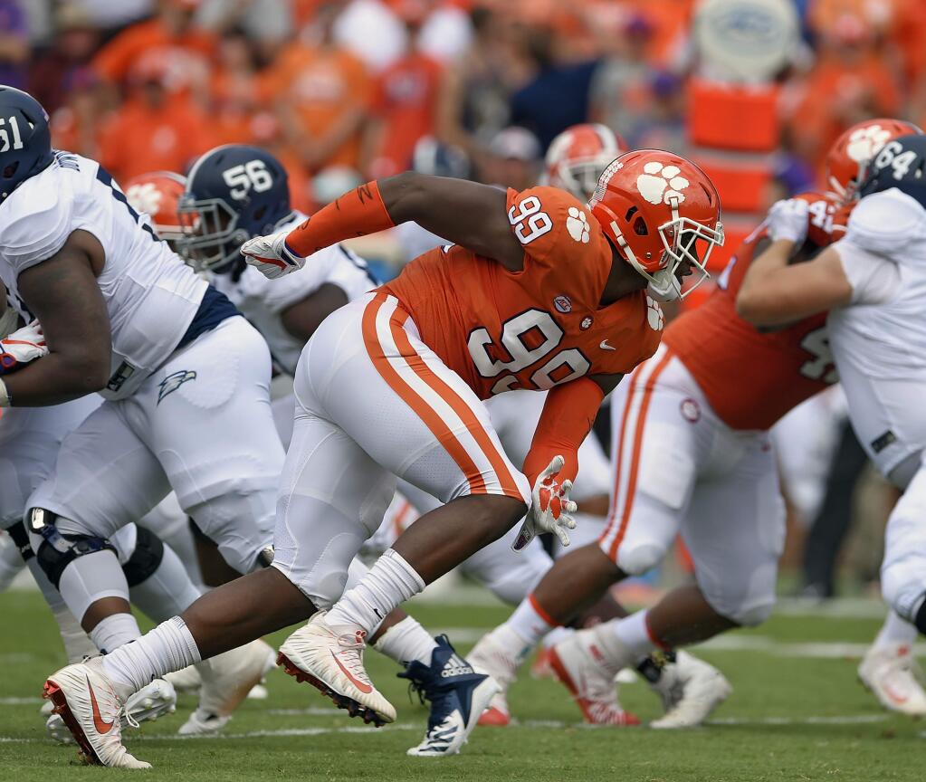 In this Sept. 15, 2018, file photo, Clemson's Clelin Ferrell rushes into the backfield during the first half against Georgia Southern, in Clemson, S.C. (AP Photo/Richard Shiro, File)
