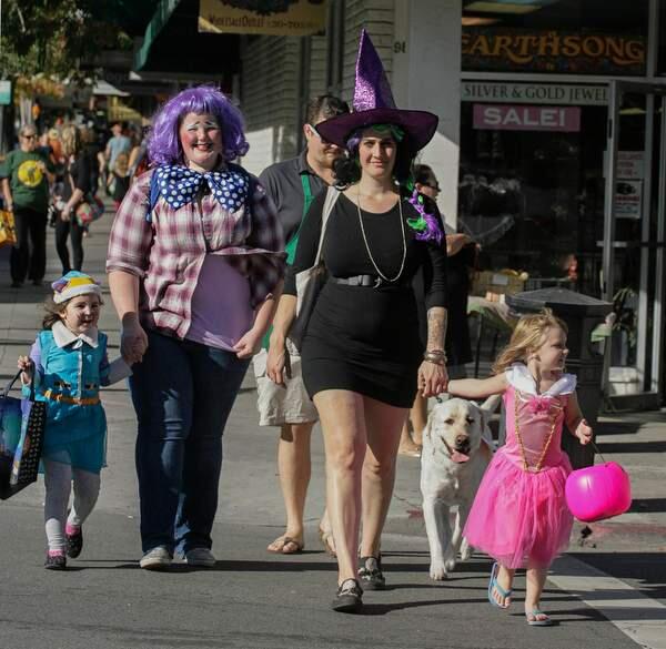 Violet 4 and Katy Eldridge, Kristin Mo and Amelia 4 crossing Western Avenue on Halloween in downtown Petaluma Saturday, Oct, 3, 2015.(JOHN O'HARA FOR THE ARGUS-COURIER)