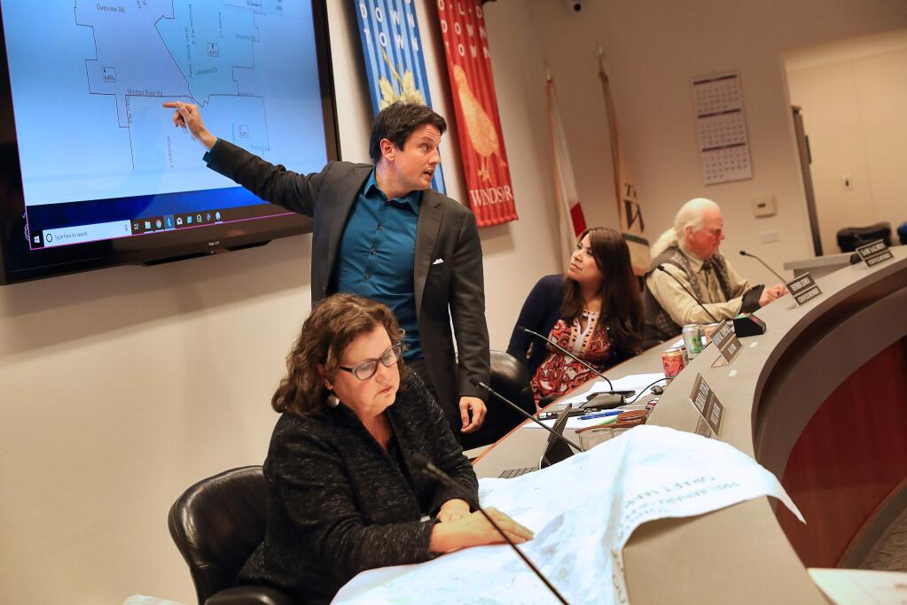 From left: Windsor Town Councilwoman Deb Fudge, Mayor Dominic Foppoli, Councilwoman Esther Lemus and Vice Mayor Sam Salmon are tasked with considering whether to make an appointment or hold a special election to fill their vacant fifth council seat. (Christopher Chung / The Press Democrat) 2019
