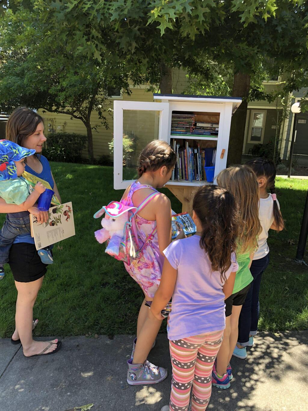 A Little Free Library was installed at the Madrone housing complex in Petaluma to promote literacy. ERIN HAWKINS FOR THE ARGUS-COURIER