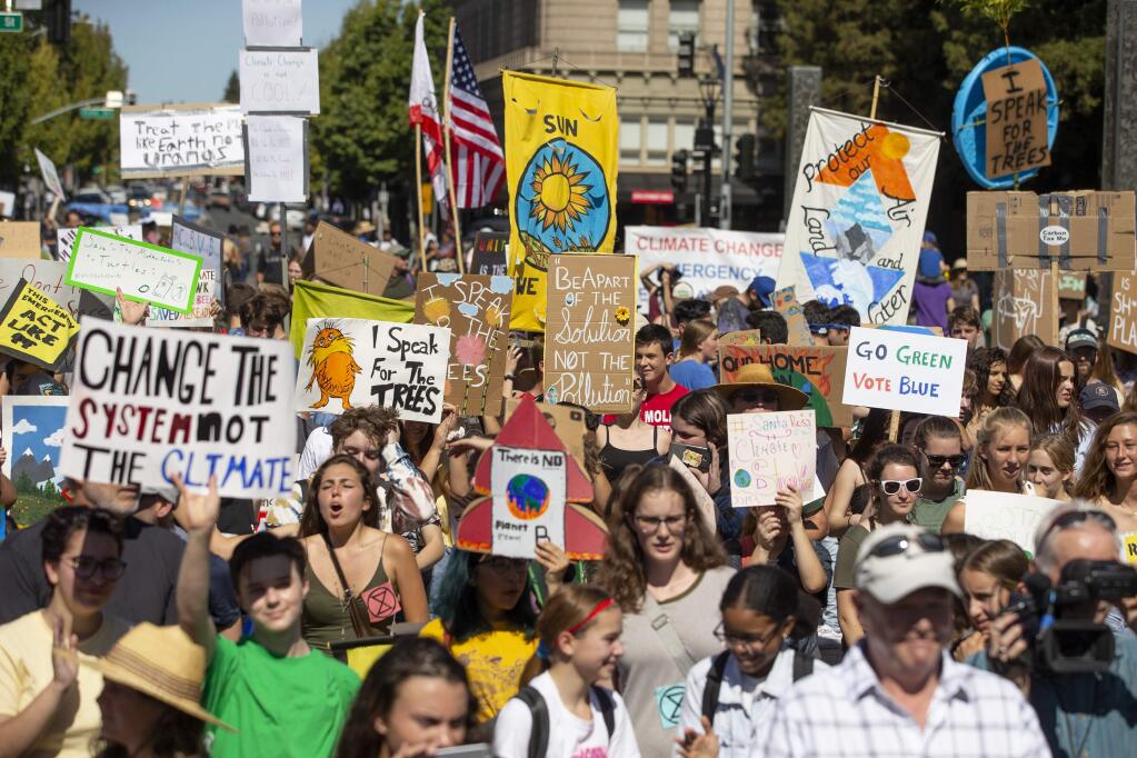 About 2,000 protesters gathered in Old Courthouse Square in Santa Rosa for the Sonoma County Climate Strike on Friday, Sept. 20, 2019. (JOHN BURGESS/ PD)