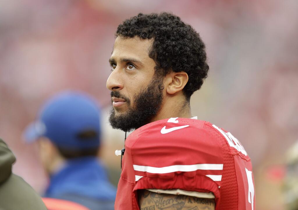 FILE - In this Nov. 8, 2015, file photo, San Francisco 49ers quarterback Colin Kaepernick (7) stands on the sideline during the first half of an NFL football game against the Atlanta Falcons in Santa Clara, Calif. The The 49ers announced Saturday, Nov. 21, 2015, that they placed Kaepernick on the injured reserve list. (AP Photo/Ben Margot)