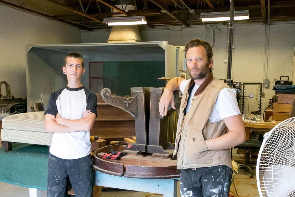 Owner Sasha Papadin (right) and apprentice Seven Karr in the shop at Pinocchio Furniture, Wednesday, May 24, 2017. (Photo by Julie Vader/Special to the Index-Tribune)