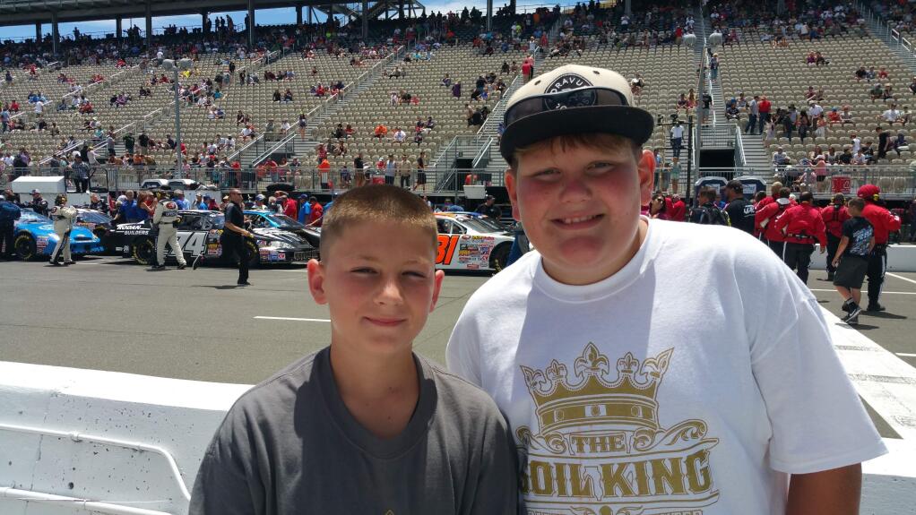 PHOTO: 1 by PATRICK KING-Washington Elementary students Trevor Perkins, left, and Patrick “PJ” King Jr. won last month's STEM Race Car Challenge at the Sonoma Raceway.