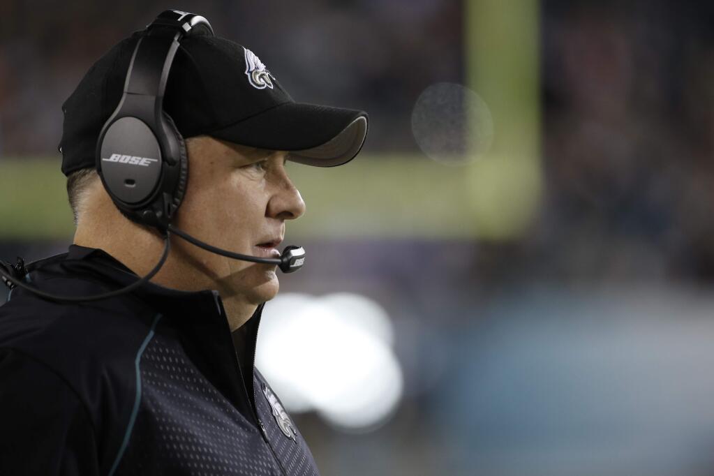 FILE- In this Dec. 26, 2015, file photo, Philadelphia Eagles head coach Chip Kelly watches from the sidelines before an NFL football game against the Washington Redskins in Philadelphia. Kelly, Adam Gase and Mike Shanahan are just a few of the hot names for teams looking for a new head coach. (AP Photo/Michael Perez, File)