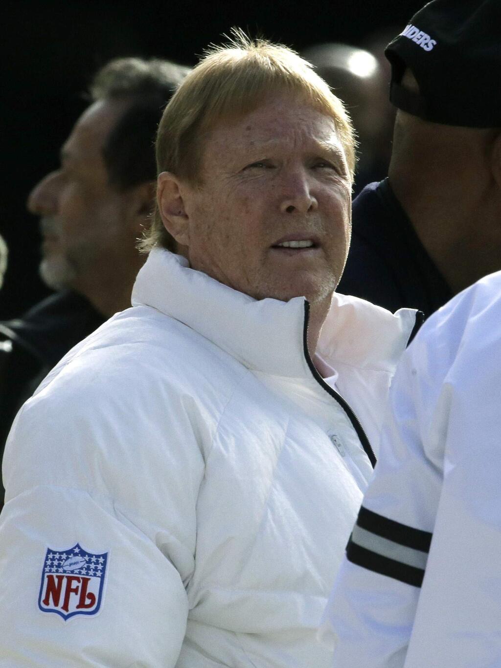 Oakland Raiders owner Mark Davis stands on the field during warmups before a game against the Denver Broncos, Sunday, Jan. 1, 2017, in Denver. (AP Photo/Joe Mahoney)