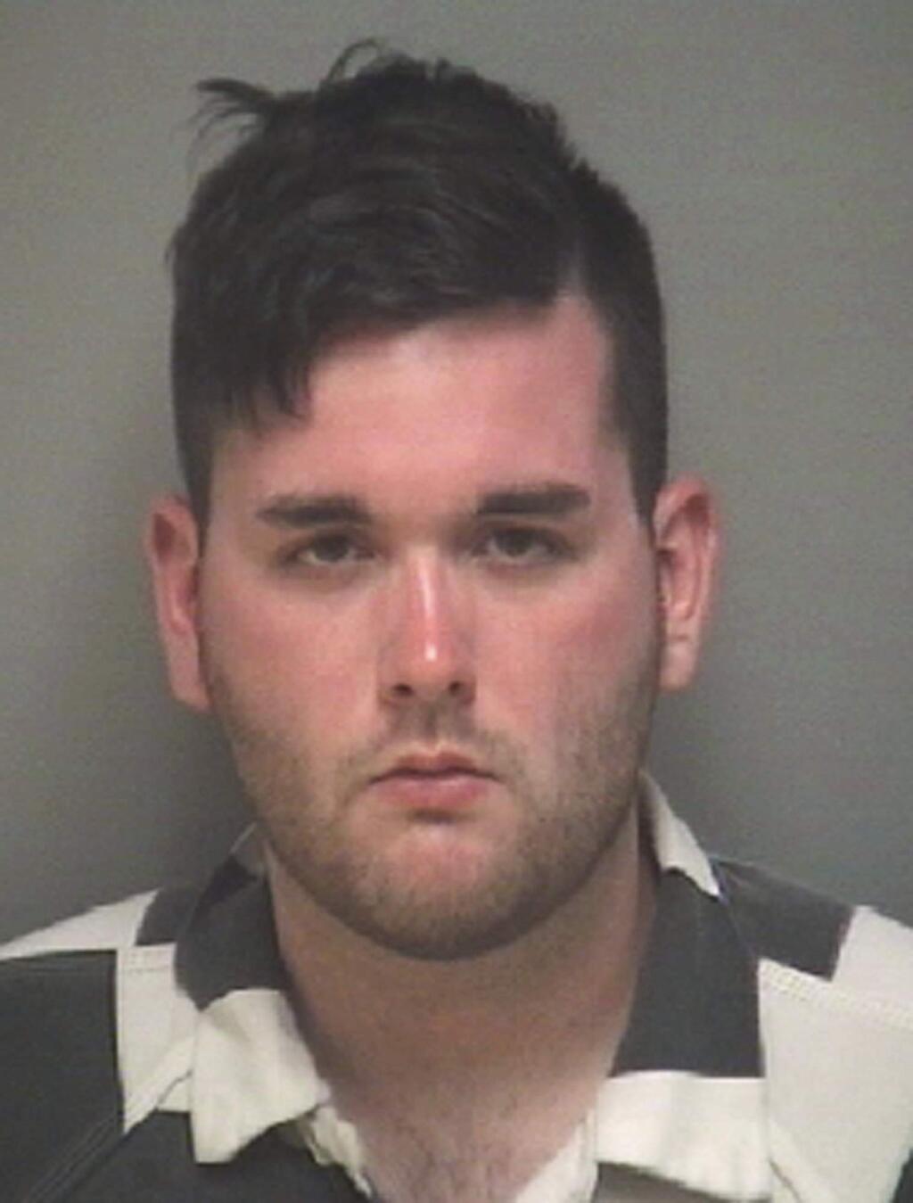 FILE - This undated file photo provided by the Albemarle-Charlottesville Regional Jail shows James Alex Fields Jr., accused of plowing a car into a crowd of people protesting a white nationalist rally in Charlottesville, Va., killing a woman and injuring dozens more, has been charged with federal hate crimes. The Department of Justice announced that Fields was charged in an indicted returned Wednesday, June 27, 2018. (Albemarle-Charlottesville Regional Jail via AP, File)