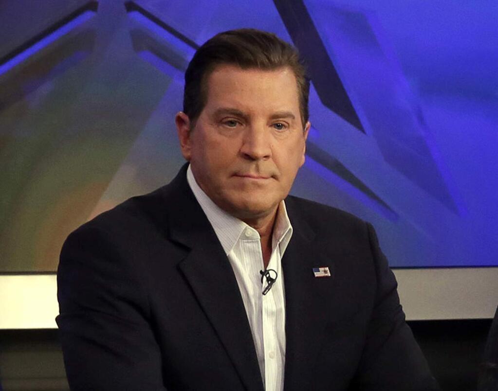 FILE - In this July 22, 2015 file photo, co-host Eric Bolling appears on 'The Five' television program, on the Fox News Channel, in New York. Fox News announced on Saturday, Aug. 5, 2017, that Bolling has been suspended while it investigates a report that “The Specialists” co-host sent at least three female colleagues a lewd text message. Bolling's lawyer calls the accusations untrue and says he and his client are cooperating with the investigation. (AP Photo/Richard Drew, File)
