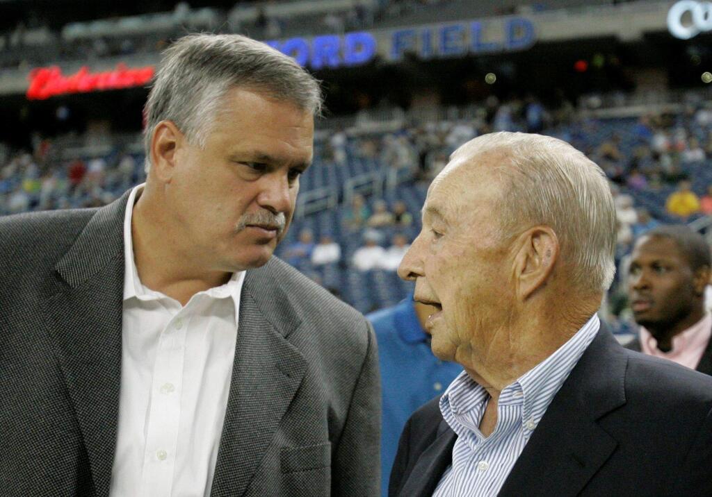 Then-Detroit Lions president and CEO Matt Millen, left, talks with team owner and chairman William Clay Ford before the start of a game against the Green Bay Packers in Detroit, Sunday, Sept. 14, 2008. (AP Photo/Carlos Osorio)