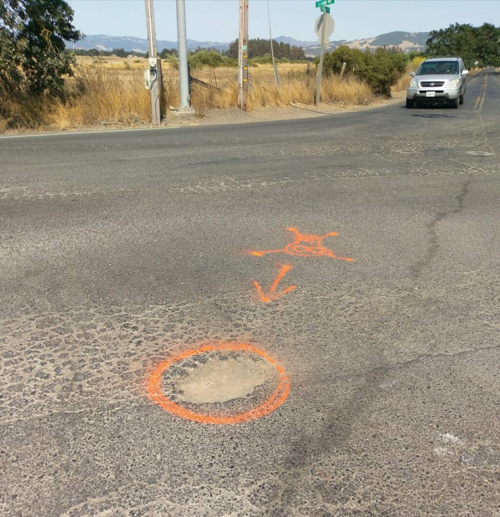 The Pothole Bandits, a pair of safety-minded vigilantes, say Walker Road has surpassed Barnett Valley Road as the worst road in Sonoma County. (Facebook)