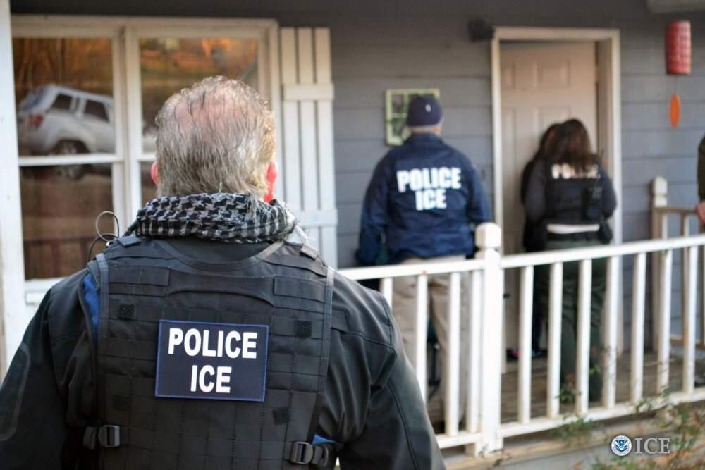 A undated photo provided by U.S. Immigrations and Customs Enforcement showing an enforcement action at an undisclosed location.