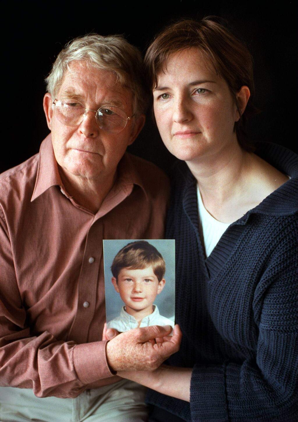 Reg and Maggie Green with a photo of their son, Nicholas, who was killed while the family was vacationing in Sicily. (PD FILE)