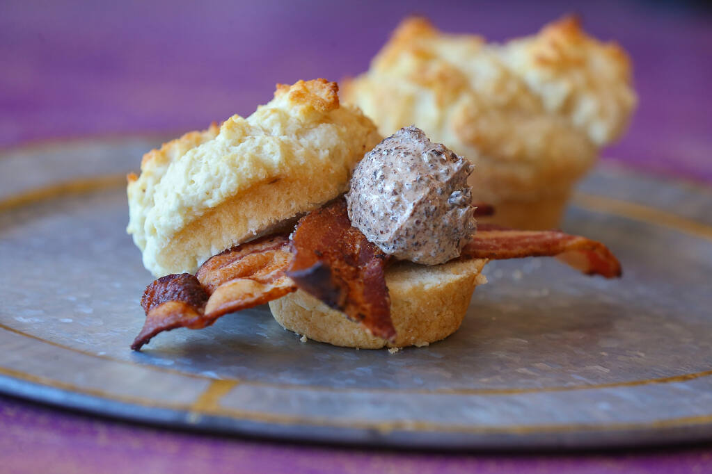 Big Bottom Market Biscuit with Black Pig Bacon and Cherry Black Pepper Butter made by Sheana Davis at The Epicurean Connection. (Christopher Chung/ The Press Democrat)