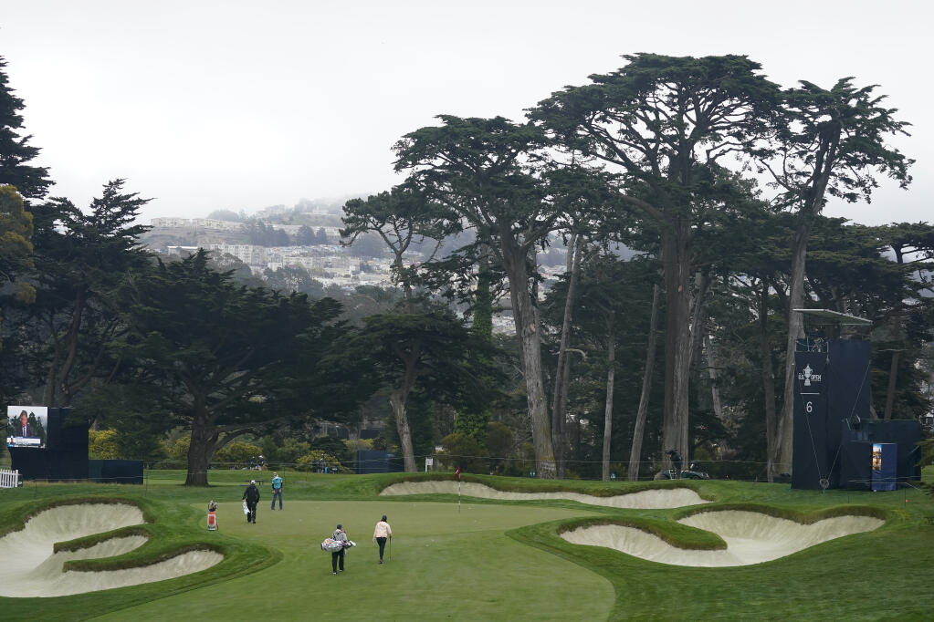 Michelle Wie West, bottom center, walks toward the sixth green during a practice round at the U.S. Women's Open in San Francisco on Wednesday, June 2, 2021. (Jeff Chiu / ASSOCIATED PRESS)