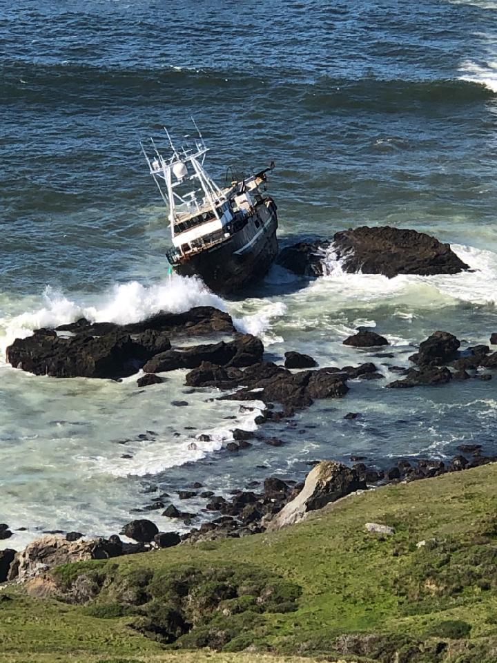The 90-foot vessel American Challenger is being monitored by an array of agencies as it is nestled around large rocks in a remote area south of Estero de San Antonio. ((Office of Spill Prevention and Response / Facebook)