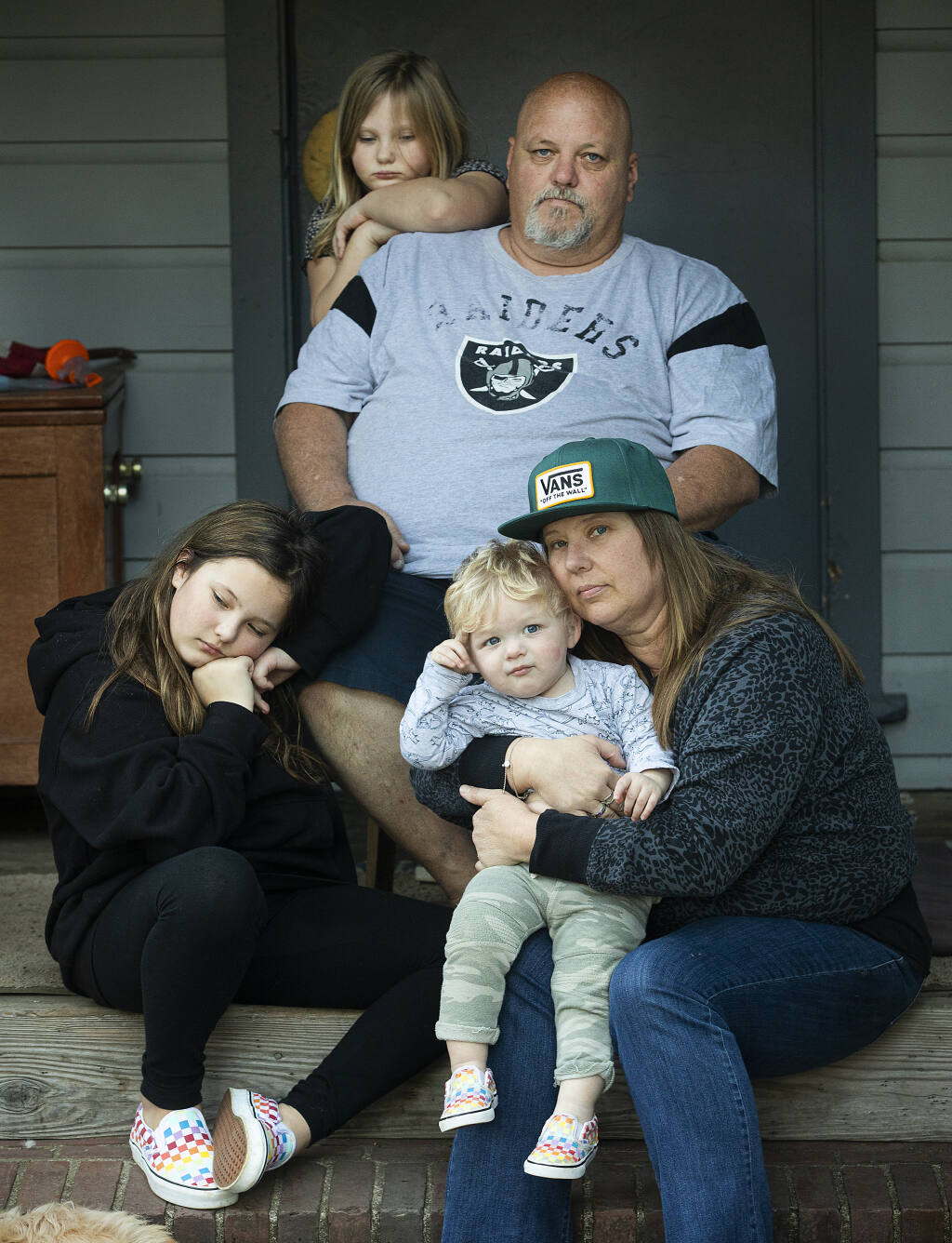 When Joe Morrell, top right, and his daughter, Patsy, 9, lower left, went to buy ice cream in the Guerneville Safeway for the shared birthday of Patsy's mom Iva, 47, lower right, and Jillian, 7, top left, a truck smashed into the back of their parked pickup before driving away and crashing last Tuesday. Iva, Jillian and Indigo, 18 months, were inside their pickup when it was struck. Photo taken on Friday, Feb. 26, 2021. (John Burgess / The Press Democrat)