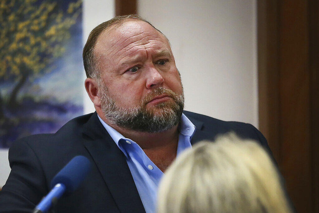 Alex Jones attempts to answer questions about his emails during his trial at the Travis County Courthouse in Austin, Texas. (BRIANA SANCHEZ / Austin American-Statesman)