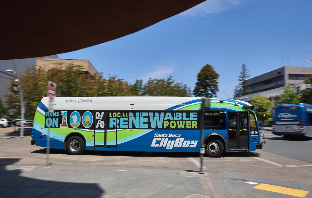 A new all-electric Santa Rosa CityBus exits the downtown Transit Mall for Montecito Center in Santa Rosa, Tuesday, June 27, 2023.  (Christopher Chung / The Press Democrat)
