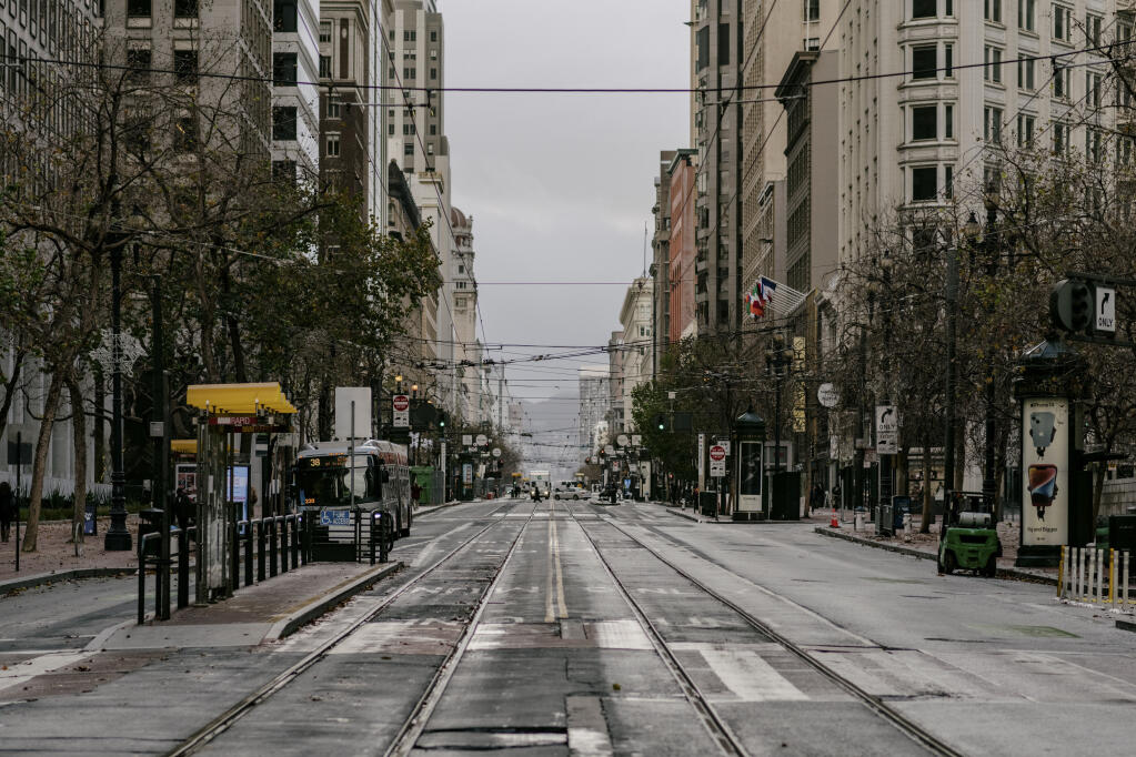 Market Street on a Saturday afternoon in downtown San Francisco, Dec. 10, 2022. Three years ago, downtown San Francisco was a picture of an economically successful city. Much has changed. (Aaron Wojack/The New York Times)