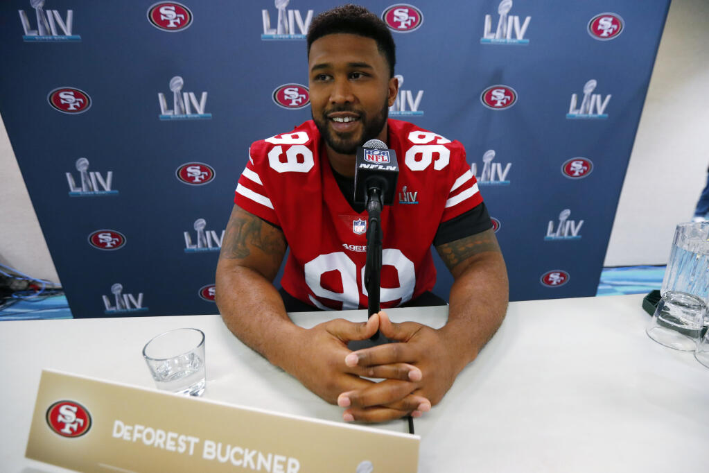 San Francisco 49ers defensive tackle DeForest Buckner smiles as he speaks during a media availability on Wednesday, Jan. 29, 2020, in Miami, for NFL Super Bowl 54. (Wilfredo Lee / ASSOCIATED PRESS)