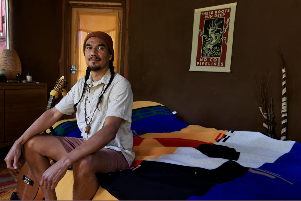 Ras K'Dee, an Indigenous artist, youth worker and founder of SNAG Magazine, in Forestville, Thursday, April 13, 2023. (Kent Porter / The Press Democrat)