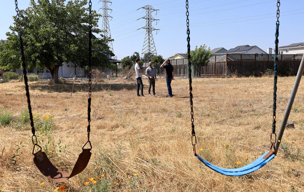 A swing set left from a school that burned in the Tubbs Fire is on land where the Mark West Area Community Fund hopes to build a park. (KENT PORTER / The Press Democrat)