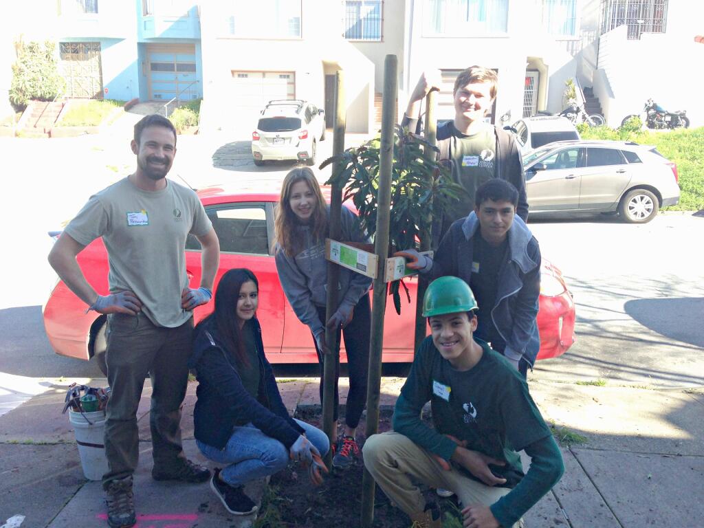 The six Enviroleaders are planting free trees for Highway 12 residents as part of a new Ecology Center program.