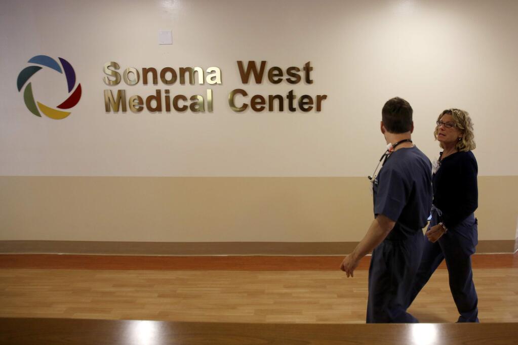 Staff prepare for the opening of the new Sonoma West Medical Center, formerly Palm Drive Hospital in Sebastopol, on Thursday, July 16, 2015 .(BETH SCHLANKER/ The Press Democrat)
