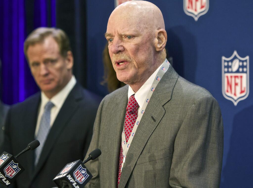 FILE -In this Dec. 10, 2014 file photo Houston Texans owner Bob McNair speaks at an NFL press conference during an owners meeting, in Irving, Texas. At left is NFL commissioner Roger Goodell. McNair has apologized after a report said he declared “we can't have the inmates running the prison” during a meeting of NFL owners over what to do about players who kneel in protest during the national anthem. (AP Photo/Brandon Wade, File)