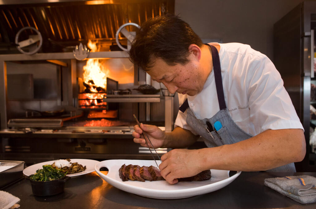 Co-owner Joshua Smookler, prepares Wagyu Ribeye at his restaurant Animo in Sonoma, Wednesday, March 30, 2022. (Darryl Bush / For The Press Democrat file)