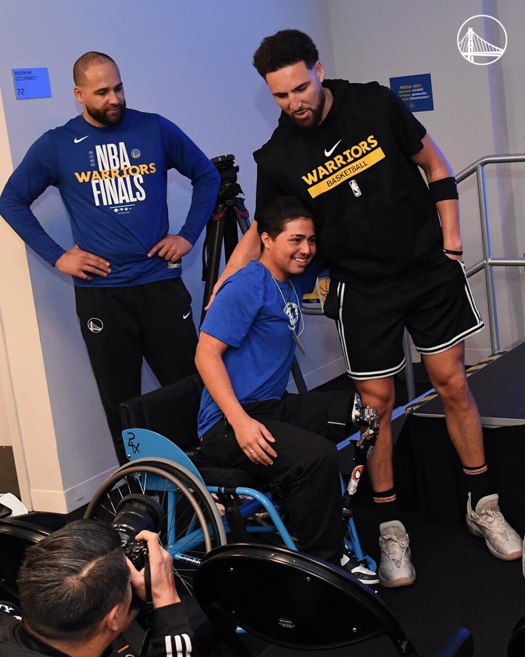 Golden State Warriors’ Klay Thompson, right, presented Braulio Noriega with a birthday surprise before Saturday’s game against the Milwaukee Bucks. (Golden State Warriors / Twitter)