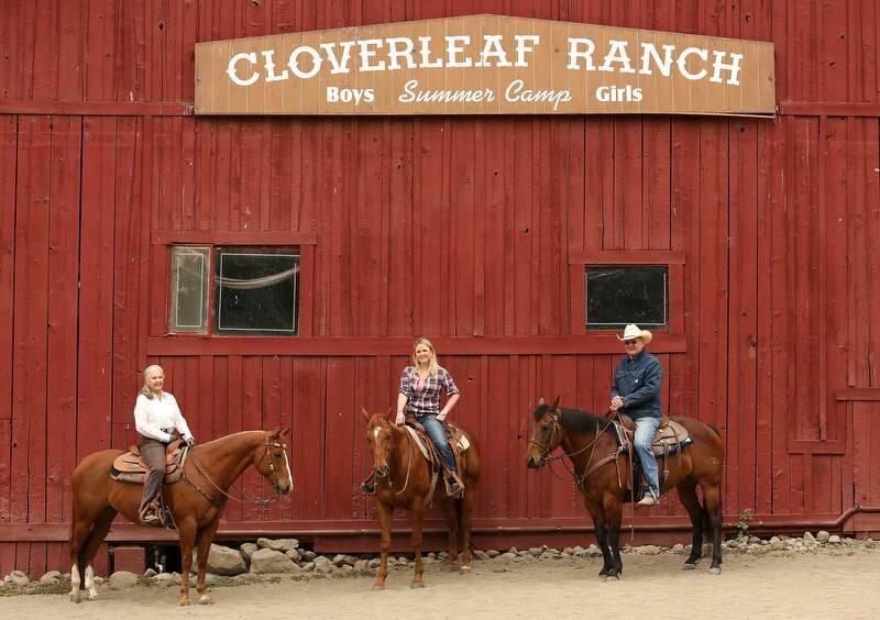 Shawna DeGrange, center, on Bill, with her parents Ginger DeGrange, left, on Hank and Ron DeGrange, right, on Arnie, at Cloverleaf Ranch in Santa Rosa, Wednesday, May 8, 2013. (Crista Jeremiason / The Press Democrat)