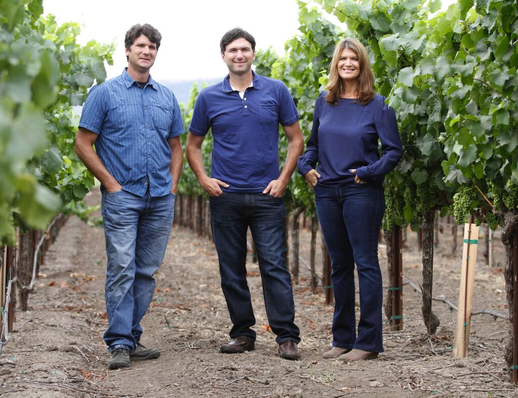 Mike and Steve Sangiacomo and Mia Pucci are third-generation winemakers at Sangiacomo Vineyards. The entire Sangiacomo family are honored as the Sonoma County Farm Bureau's Farm Family of the Year on July 16, 2015. (Bill Hoban/Index-Tribune)