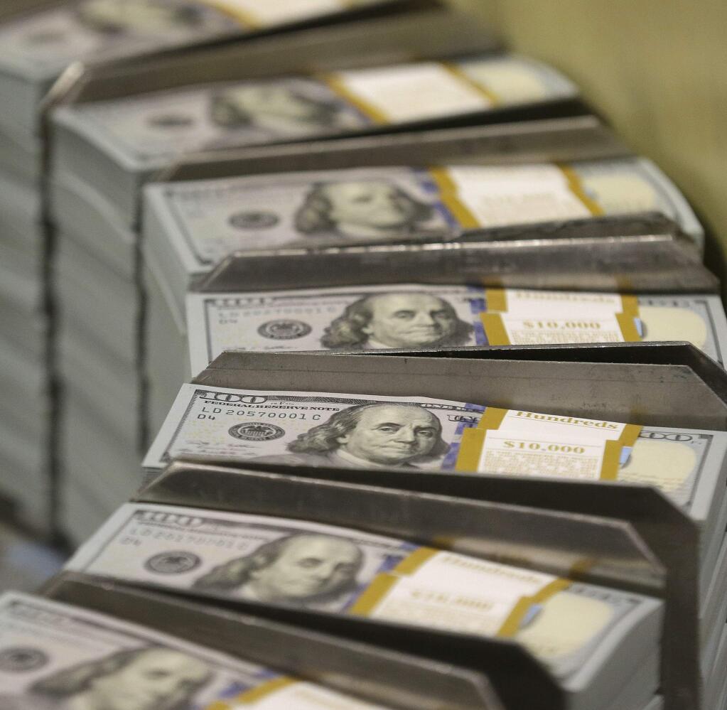 Foreign demand for U.S. currency is soaring. In 2018, the United States exported $65.3 billion worth, most of it in $100 bills. (LM OTERO / Associated Press, 2013)