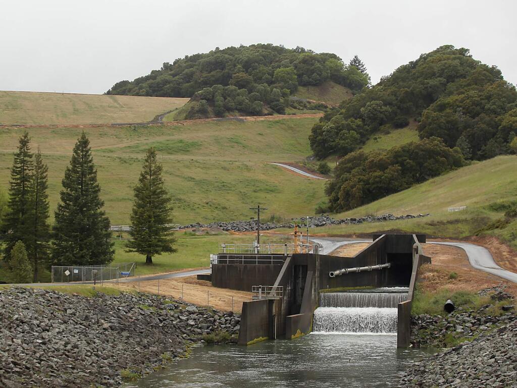 Water from Lake Sonoma at the Warm Springs Dam empties in to Dry Creek, Tuesday April 10, 2012 near Healdsburg. (Kent Porter / Press Democrat) 2012