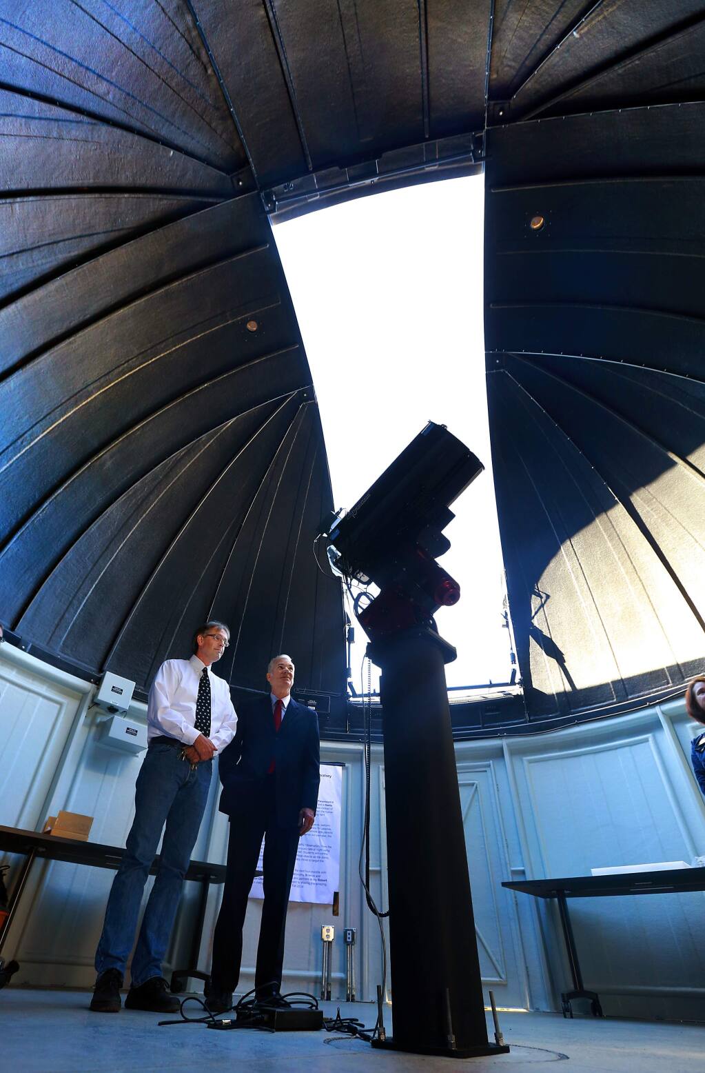 Space Science instructor Kurt Kruger, left, shows State Superintendent of Public Instruction Tom Torlakson the SPARQ Center Observatory at Piner High School on Friday, October 3, 2014.