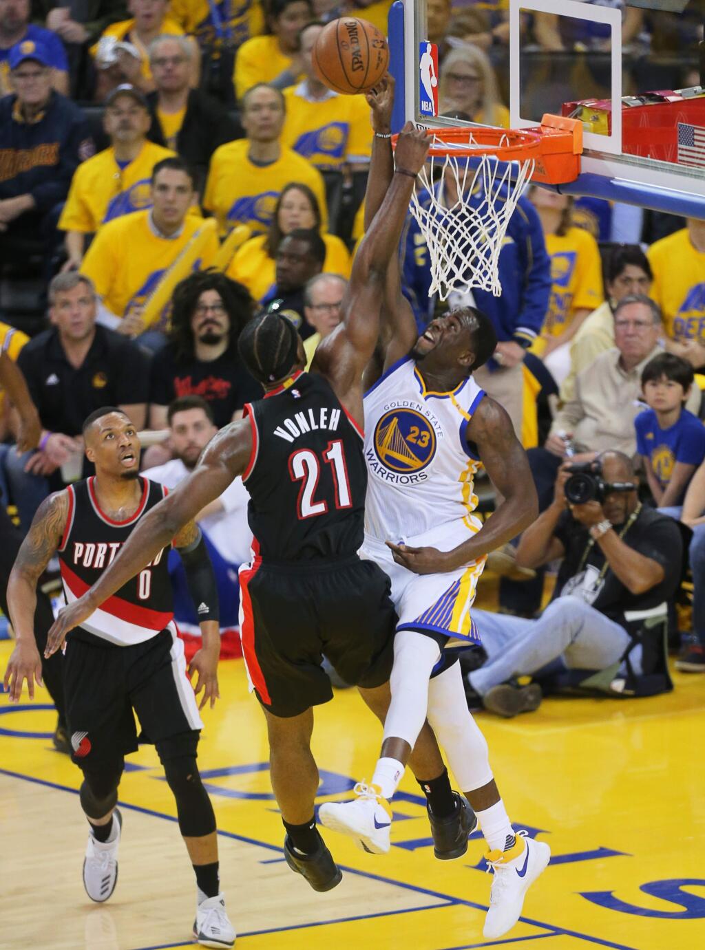 Golden State Warriors forward Draymond Green blocks a shot attempt by Portland Trail Blazers forward Noah Vonleh during Game 1 of the first round of the NBA playoffs in Oakland on Sunday, April 16, 2017. The Warriors defeated the Trail Blazers 121-109. (Christopher Chung / The Press Democrat)