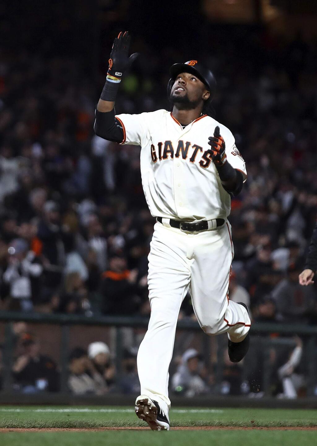 The San Francisco Giants' Alen Hanson celebrates after hitting a two-run home run off St. Louis Cardinals' Luke Weaver during the sixth inning of a baseball game Thursday, July 5, 2018, in San Francisco. (AP Photo/Ben Margot)