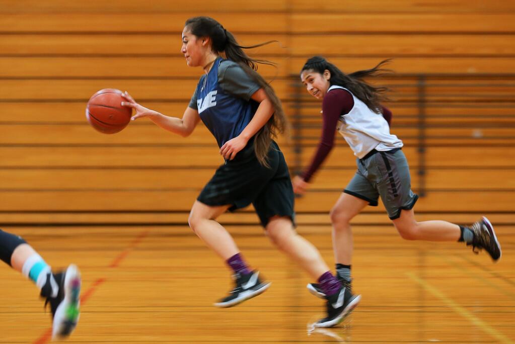 Elsie Allen's Samantha Holguin leads a fast break during practice in Santa Rosa on Monday, January 6, 2020. (Christopher Chung / The Press Democrat)