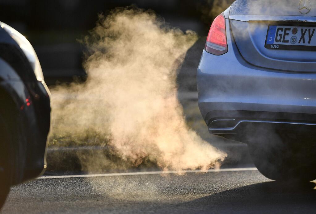 Commuters drive in their cars to work in Gelsenkirchen, Germany, Tuesday morning, Feb. 27, 2018. A German court decides today on whether to allow a ban on diesel cars in cities to lower air pollution, a move that could have drastic consequences for the country's powerful auto industry. (AP Photo/Martin Meissner)