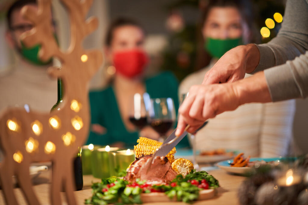 If you must, enjoy a small holiday gathering with appropriate health precautions, advise Bay Area health officers. (Kamil Macniak/Shutterstock)
