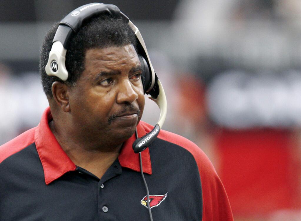 In this Sept. 24, 2006 file photo, Arizona Cardinals head coach Dennis Green watches from the sidelines during the first half against the St. Louis Rams in Glendale, Ariz. Green, a trailblazing coach who led a Vikings renaissance in the 1990s and also coached the Arizona Cardinals, has died. He was 67. Green's family posted a message on the Cardinals website on Friday, July 22, 2016, announcing the death. (AP Photo/Rick Hossman, File)