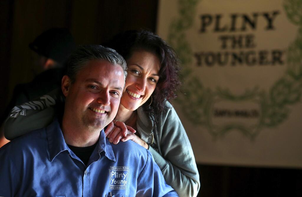 JOHN BURGESS / The Press DemocratRussian River Brewing Company owners Vinnie and Natalie Cilurzo on the first day of the release of Pliny the Younger in Santa Rosa on Friday. (JOHN BURGESS / The Press Democrat)