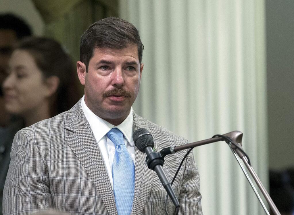 FILE - In this Aug. 15, 2016 file photo, Assemblyman Joaquin Arambula, D-Kingsburg, speaks at the Capitol in Sacramento, Calif. California prosecutors are charging Arambula with misdemeanor cruelty to a child, which could bring six months in jail. Fresno County's district attorney said Tuesday, March 12, 2019, that Assemblyman Joaquin Arambula is charged with inflicting unjustifiable physical pain or mental suffering on a child. (AP Photo/Rich Pedroncelli, File)