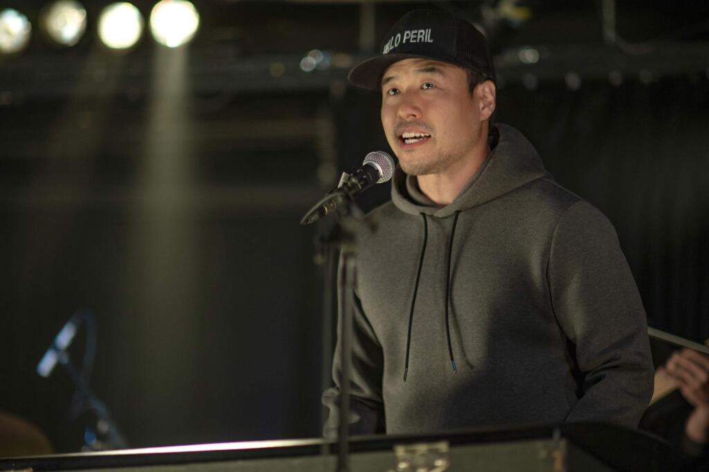 This undated image shows Randall Park in a scene from the movie 'Always Be My Maybe.' The newly released Netflix movie is an Asian-American rom-com with a twist: ethnicity isn't central to the plot. (Courtesy of Netflix)