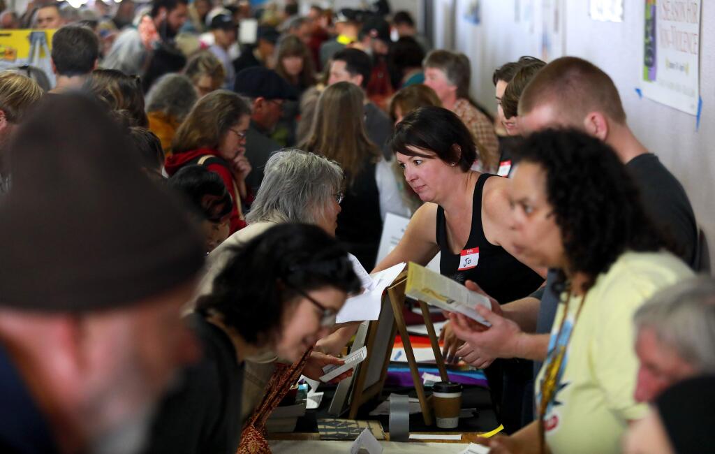 More than 100 organizations recruited volunteers and activists at the North Bay Community Engagement Fair in Garrett Hall at the Sonoma County Fairgrounds on Sunday, Jan. 29, 2017. (John Burgess/The Press Democrat)