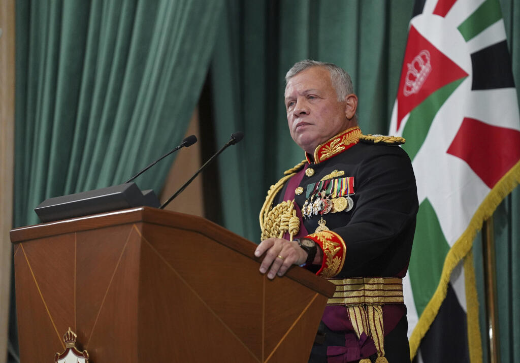 FILE - In this Dec. 10, 2020 file photo released by the Royal Hashemite Court, Jordan's King Abdullah II gives a speech during the inauguration of the 19th Parliament's non-ordinary session, in Amman Jordan. Jordan’s king addressed the public feud with his half-brother, Prince Hamzah, portraying it as an attempted “sedition” that caused him shock, anger and pain. The statement on Wednesday, April 7, 2021, carried by Jordan TV, marked the first time King Abdullah II addressed the unprecedented rift in the royal family which erupted over the weekend. (Yousef Allan/The Royal Hashemite Court via AP, File)