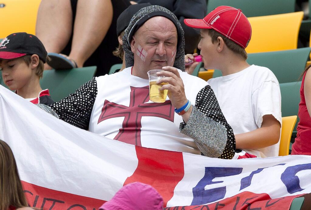 An England fan attends a FIFA Women's World Cup soccer game against Germany in Edmonton, Alberta, Canada, on Saturday July 4, 2015. (Jason Franson/The Canadian Press, Jason Franson) MANDATORY CREDIT