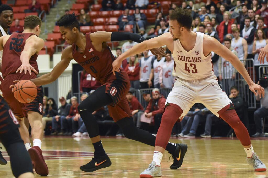 Stanford forward Kezie Okpala (0) steals the ball away from Washington State forward Drick Bernstine (43) during the first half of an NCAA college basketball game, Thursday, Jan. 11, 2018, in Pullman, Wash. (AP Photo/Pete Caster)