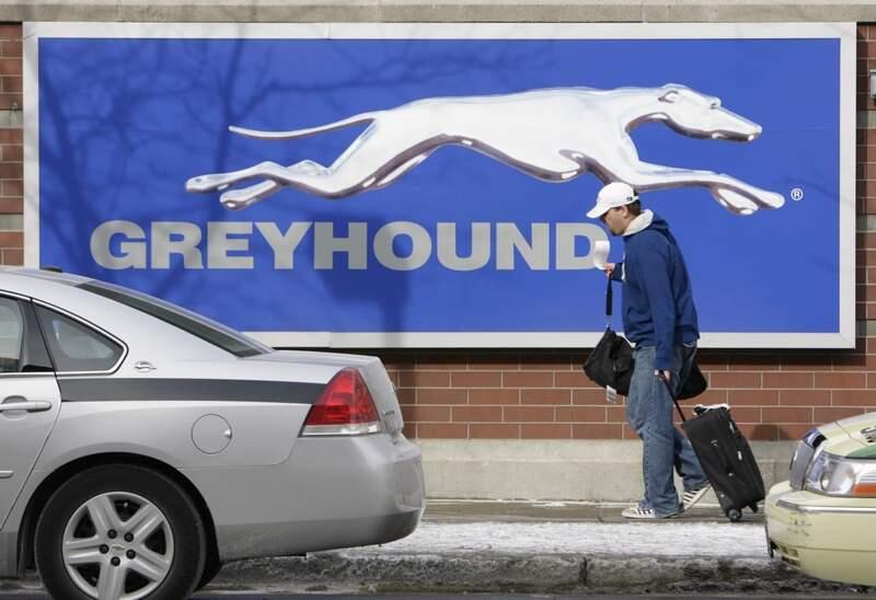 A traveler walks outside the downtown Chicago Greyhound bus station Friday, Feb. 9, 2007. (AP Photo/Nam Y. Huh)